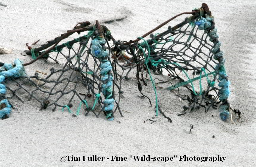 Lobster Pots Buried in the Sand